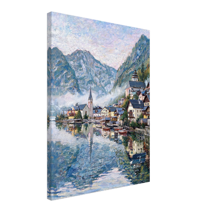 A vertical canvas wall art print depicting an impressionist mountain village scene by a lake, shown at a slight angle against a plain white background.