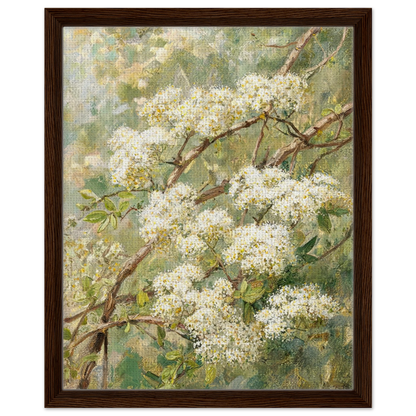 Framed canvas print of an Impressionist white blossom branch painting mounted in a sleek frame for a polished gallery presentation. dark wood frame.