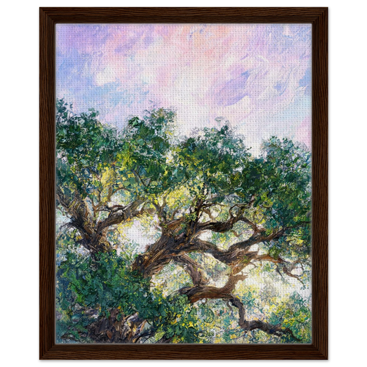 Framed canvas print of an Impressionist sunlit tree painting mounted in a sleek frame for a polished gallery presentation.
