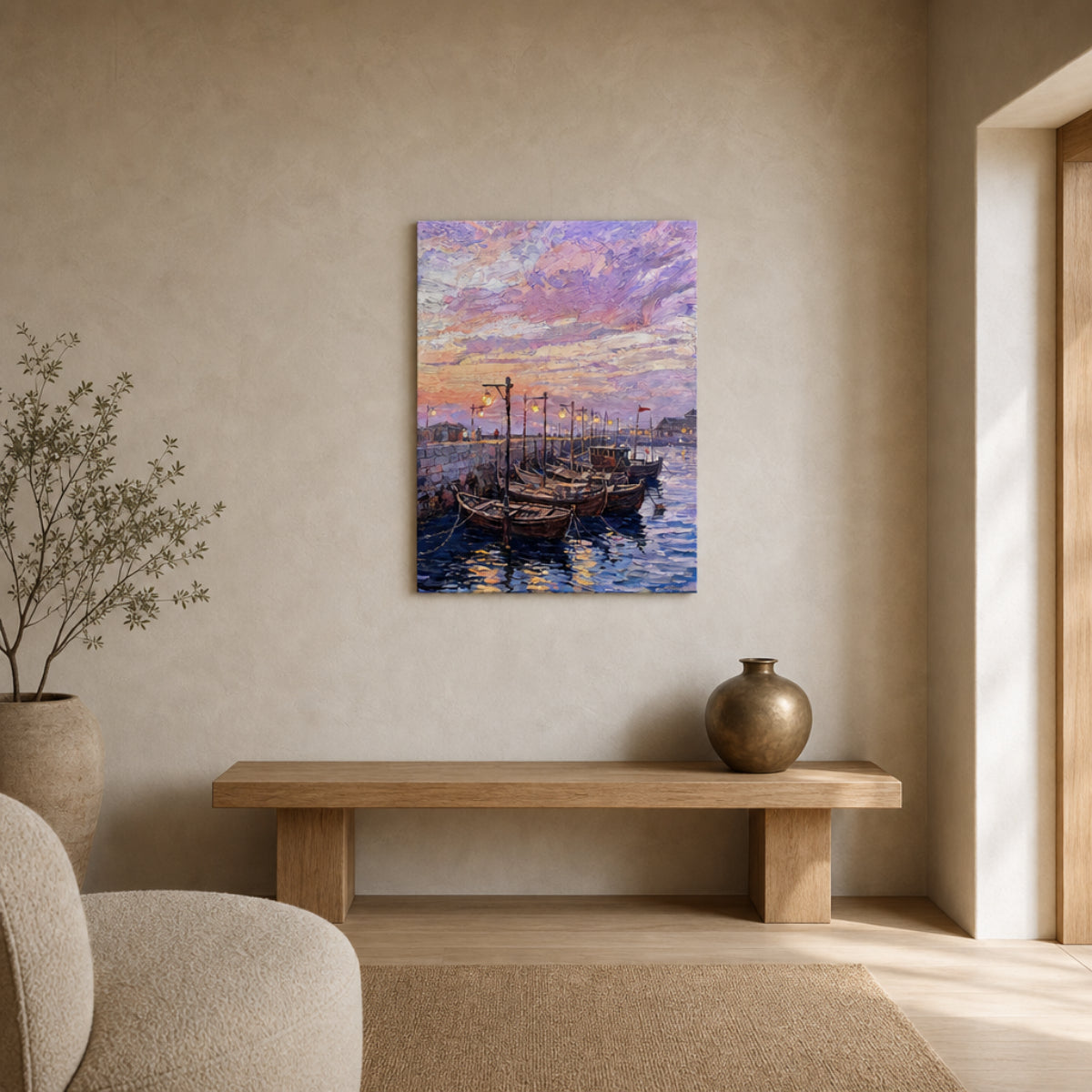 A vertical canvas print of an impressionist harbor painting with boats under a purple and pink sky, displayed on a textured beige wall above a wooden bench in a modern living room setting.